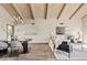 Open-concept living room showcasing vaulted ceilings and an elegant aesthetic with lots of natural light at 10540 N 78Th Pl, Scottsdale, AZ 85258