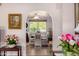 Dining room with natural light, table with four chairs, and views of outdoor greenery at 10846 W Crosby Dr, Sun City, AZ 85351