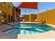 Outdoor pool and spa area featuring tiled steps, railings, and lounge chairs for relaxation at 10846 W Crosby Dr, Sun City, AZ 85351