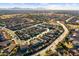 Expansive aerial view showcasing a well-planned community with beautiful landscaping and mountain views at 1101 W Oleander Ave, Queen Creek, AZ 85140