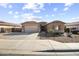 Charming single-story home with desert landscaping and a two-car garage in a quiet neighborhood at 1101 W Oleander Ave, Queen Creek, AZ 85140