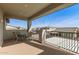 Balcony with outdoor seating, providing a relaxing space to enjoy the community views at 11679 W Parkway Ln, Avondale, AZ 85323