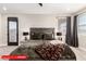 Main bedroom featuring a ceiling fan and natural light from two windows at 11679 W Parkway Ln, Avondale, AZ 85323