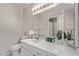 Bright bathroom with a modern vanity, quartz countertop, and decorative plant at 1310 S Pima St # 34, Mesa, AZ 85210