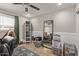 Bedroom showcasing tile flooring, a ceiling fan and a bright window at 1310 S Pima St # 34, Mesa, AZ 85210