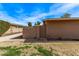 Charming single-story home featuring a private entrance and well-maintained front yard at 1310 S Pima St # 34, Mesa, AZ 85210