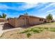 Exterior view of a well-maintained home with a grassy front yard at 1310 S Pima St # 34, Mesa, AZ 85210