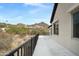 Spacious balcony with black railing overlooking desert landscape at 1428 E Las Palmaritas Dr, Phoenix, AZ 85020