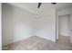 Well-lit bedroom with closet and tile floor at 1428 E Las Palmaritas Dr, Phoenix, AZ 85020