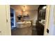 Bathroom featuring a jet tub, dark wood cabinets and decor at 14440 N 56Th Pl, Scottsdale, AZ 85254