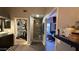 Bathroom featuring dual sinks, a shower and access to a walk-in closet at 14440 N 56Th Pl, Scottsdale, AZ 85254