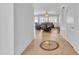 Inviting entryway leads to a spacious living area with tile flooring and comfortable seating at 14612 W Edgemont Ave, Goodyear, AZ 85395