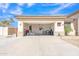 Spacious garage with ample storage, well-lit and organized, providing a functional area for vehicles and projects at 14612 W Edgemont Ave, Goodyear, AZ 85395