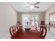 Formal dining area with ample seating, sliding door access and bright, natural light at 15479 W Whitton Ave, Goodyear, AZ 85395