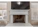 Elegant fireplace with decorative mantle, ready to add warmth and ambiance to the living space at 15479 W Whitton Ave, Goodyear, AZ 85395