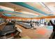 Bright fitness center with modern equipment, mirrored walls, and ample workout space at 15479 W Whitton Ave, Goodyear, AZ 85395