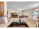 Modern kitchen sink with view into the bright and open living area at 16051 W Desert Winds Dr, Surprise, AZ 85374