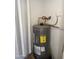 Image of a Rheem Performance Plus water heater in a utility space at 17017 N 12Th St # 1135, Phoenix, AZ 85022