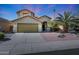 Inviting two-story home with a desert-landscaped front yard, a two-car garage, and neutral tones at 17036 N 43Rd Pl, Phoenix, AZ 85032