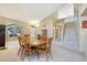 Spacious living room area featuring tall ceilings, neutral paint, and large staircase at 17036 N 43Rd Pl, Phoenix, AZ 85032