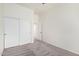 Stylish bedroom with soft carpet, ample closet space, and a neutral color scheme creating a restful atmosphere at 17642 W Pershing St, Surprise, AZ 85388