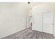 Relaxing bedroom with plush carpet, ceiling fan, and closet access, creating a comfortable personal space at 17642 W Pershing St, Surprise, AZ 85388