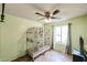 A bright room with a ceiling fan, side table, and view from the window at 19013 N 18Th Ave, Phoenix, AZ 85027