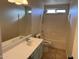 Bathroom featuring a vanity and shower at 2016 S 66Th Ln, Phoenix, AZ 85043