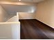 Spacious loft area with neutral walls and stylish flooring at 2016 S 66Th Ln, Phoenix, AZ 85043