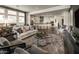 Open-concept living room and kitchen featuring hardwood floors and neutral colors at 2038 W Union Park Dr, Phoenix, AZ 85085