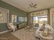 Comfortable living room featuring a ceiling fan, modern furnishings, and access to the patio at 2038 W Union Park Dr, Phoenix, AZ 85085