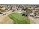 Aerial view of golf course with homes and desert landscaping at 21614 N 138Th Ave, Sun City West, AZ 85375