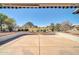 Spacious patio area with an unobstructed view of the golf course at 21614 N 138Th Ave, Sun City West, AZ 85375