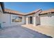 Clean front entrance with a well-maintained stucco facade, providing a welcoming first impression at 21614 N 138Th Ave, Sun City West, AZ 85375