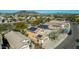 Aerial view of desert homes with solar panels on the roofs in a well-planned community at 2168 E Vista Bonita Dr, Phoenix, AZ 85024