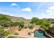 Aerial backyard view featuring a pool, desert landscaping, and mountain views at 2168 E Vista Bonita Dr, Phoenix, AZ 85024