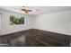 Cozy bedroom with hardwood floors and a backyard view at 2168 E Vista Bonita Dr, Phoenix, AZ 85024