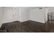 Spacious living room with hardwood floors and stainless steel refrigerator at 2168 E Vista Bonita Dr, Phoenix, AZ 85024