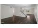 Open-concept living room with hardwood floors and staircase at 2168 E Vista Bonita Dr, Phoenix, AZ 85024