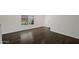 Bright living room featuring hardwood floors, white walls, and large windows at 2168 E Vista Bonita Dr, Phoenix, AZ 85024