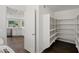 Well-organized walk-in pantry providing ample storage space adjacent to the kitchen at 2168 E Vista Bonita Dr, Phoenix, AZ 85024