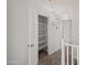 Hallway with linen storage and carpeted floor at 2168 E Vista Bonita Dr, Phoenix, AZ 85024