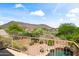 Balcony view of the backyard, pool, desert landscaping, and surrounding mountain range at 2168 E Vista Bonita Dr, Phoenix, AZ 85024