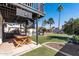 Backyard with a picnic table, outdoor entertainment area, pool, and well manicured landscaping at 24021 N 39Th Ln, Glendale, AZ 85310