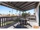 Inviting balcony features stylish seating and a view of the palm tree-lined neighborhood at 24021 N 39Th Ln, Glendale, AZ 85310