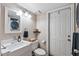 Neutral bathroom with modern vanity, sleek fixtures, and contrasting accessories at 24021 N 39Th Ln, Glendale, AZ 85310