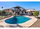 Inviting backyard pool and lounge area ideal for entertaining Gathering and friends in a relaxing atmosphere at 24021 N 39Th Ln, Glendale, AZ 85310