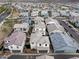 An aerial view of a neighborhood, showcasing the homes, street layout, and community design at 25268 N 142Nd Dr, Surprise, AZ 85387