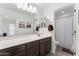 Bathroom with double vanity, spacious countertop, and bathtub at 25268 N 142Nd Dr, Surprise, AZ 85387