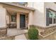 Charming covered porch with seating area with views of desert landscaping at 25268 N 142Nd Dr, Surprise, AZ 85387